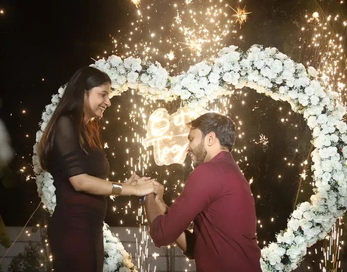 Kneeling Proposal with Fireworks